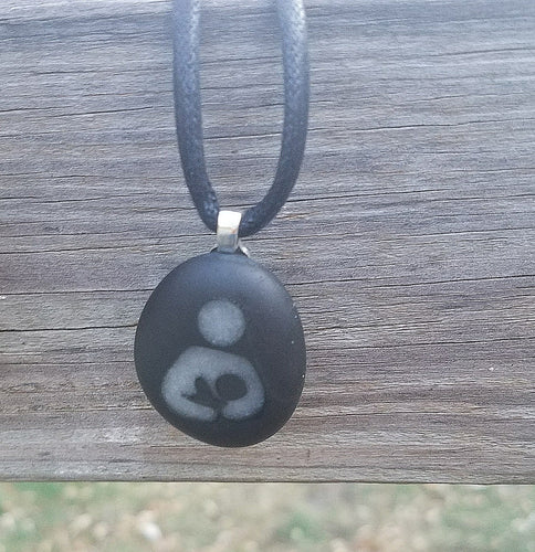 Carved stone mother/baby necklace